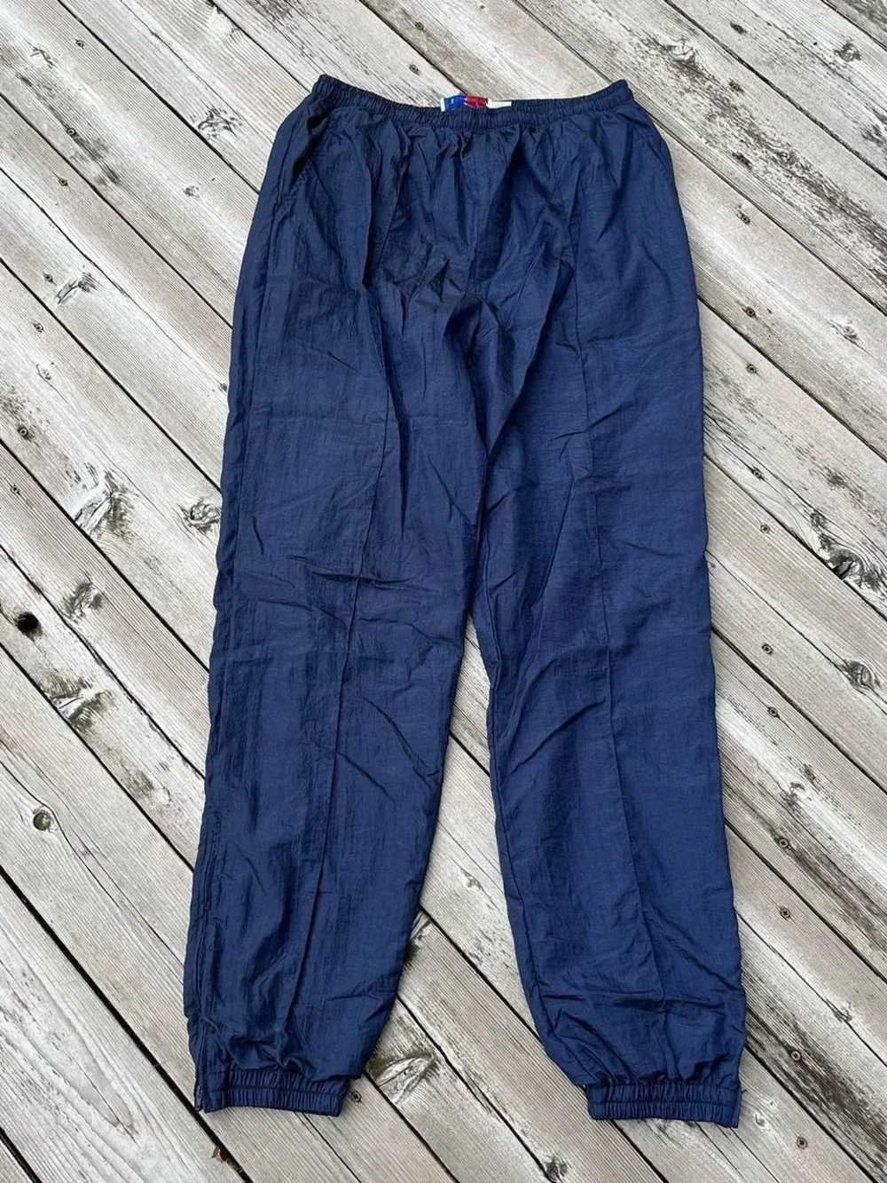Pro Celebrity navy blue windbreaker track pants